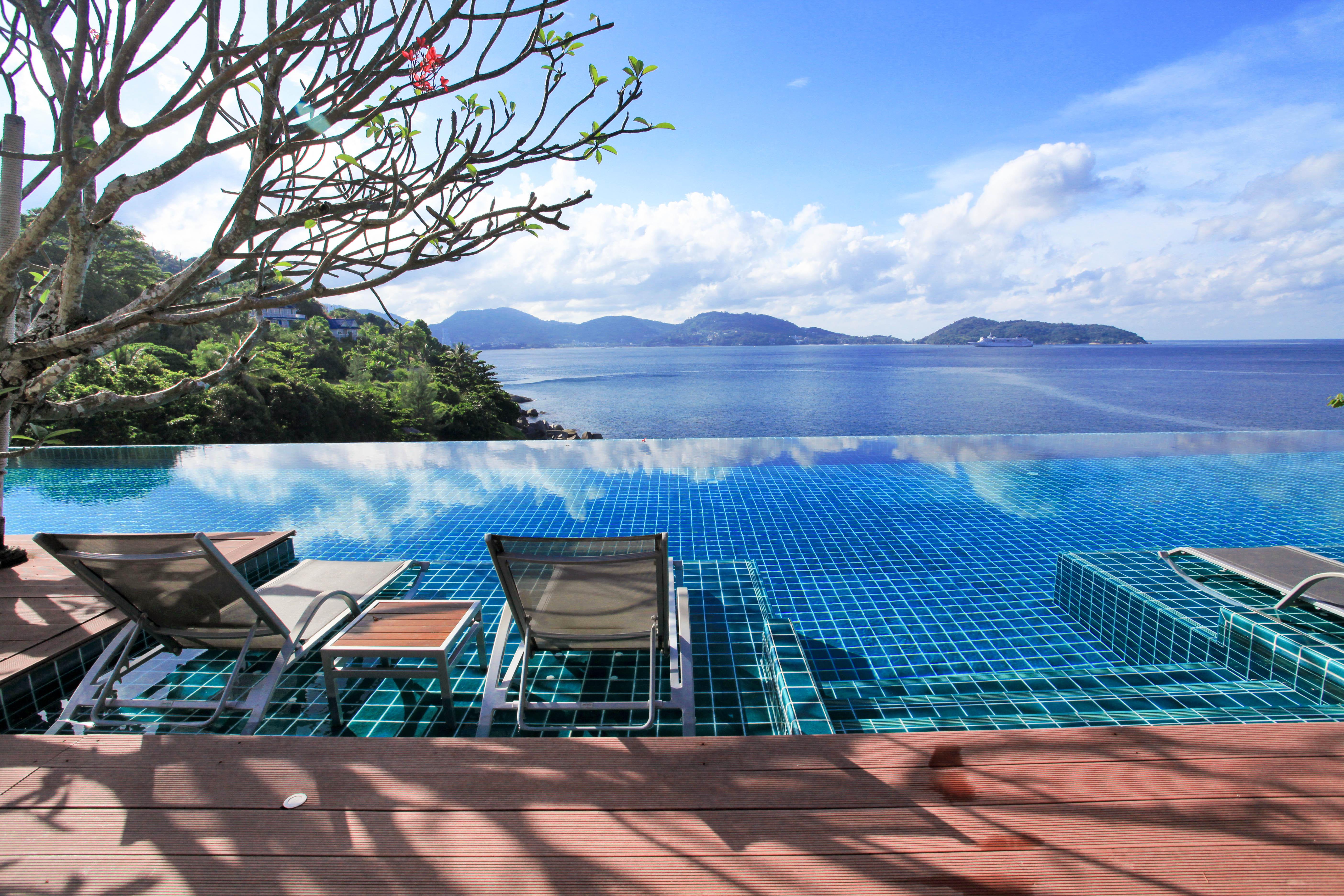 Zenmaya Oceanfront Phuket, Trademark Collection By Wyndham Patong Kültér fotó Infinity pool at a resort in Phuket, Thailand