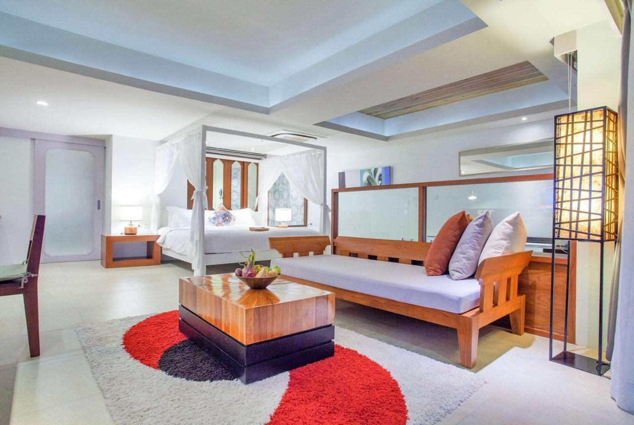 Zenmaya Oceanfront Phuket, Trademark Collection By Wyndham Patong Kültér fotó A suite at the hotel